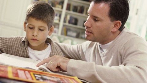 A father points out an important detail, improving his son's understanding of the assignment and lowering homework stress.