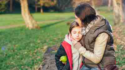 Mother comforting her daughter, who has ADHD and anxiety
