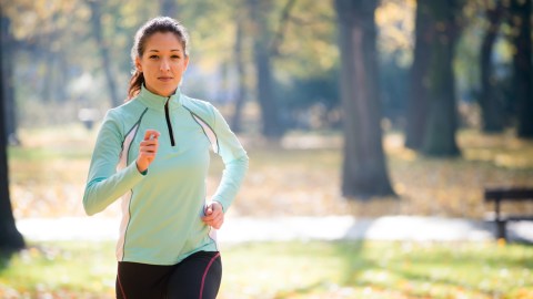 Woman with ADHD running in the park