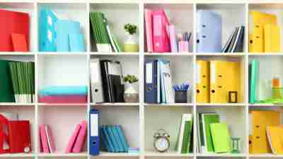 An organized bookshelf to help an adult with ADHD feel less overwhelmed