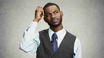 A man with ADHD or executive function disorder looking confused